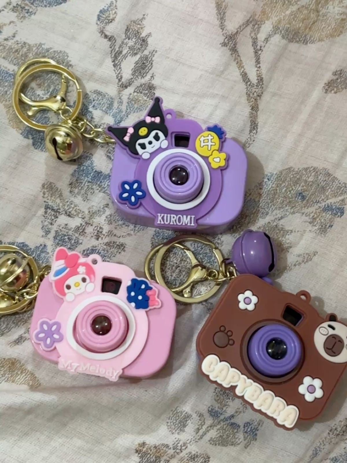 DreamBeam Projector Keychain ✨(shows cartoon characters in darkness when you click on button ) 🥰💝🎀