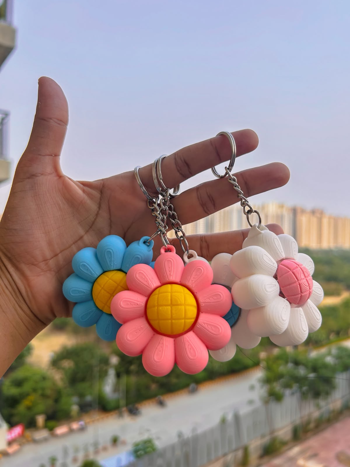 “BloomClick™ Flower Fidget Clicker Keychain | Cute Sensory Anxiety Relief keychain🌼

Meet the cutest little stress reliever you’ll carry everywhere! 💛