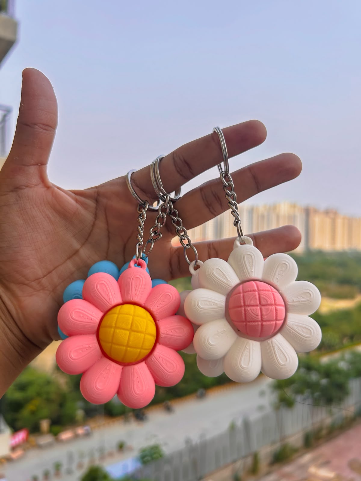 “BloomClick™ Flower Fidget Clicker Keychain | Cute Sensory Anxiety Relief keychain🌼

Meet the cutest little stress reliever you’ll carry everywhere! 💛